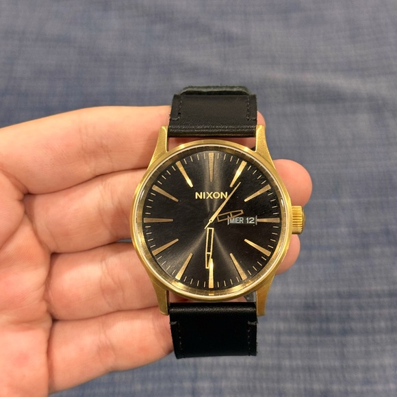 Nixon Gold and Black Watch 22k real gold works